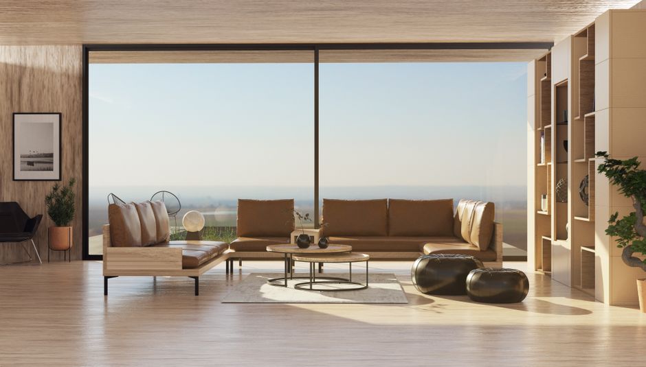 Spacious and cozy living room with large glass windows, wooden floors, and stylish decor.